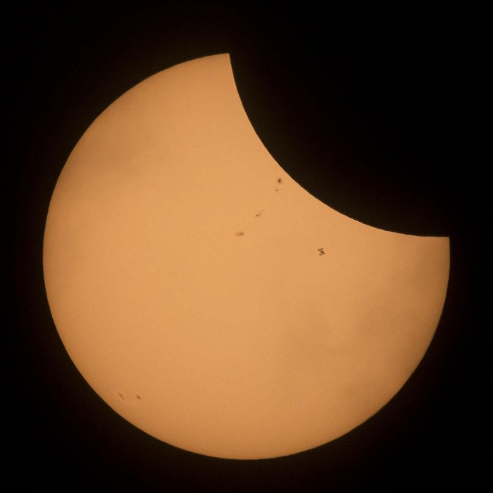 The International Space Station transits the sun during the solar eclipse.jpg