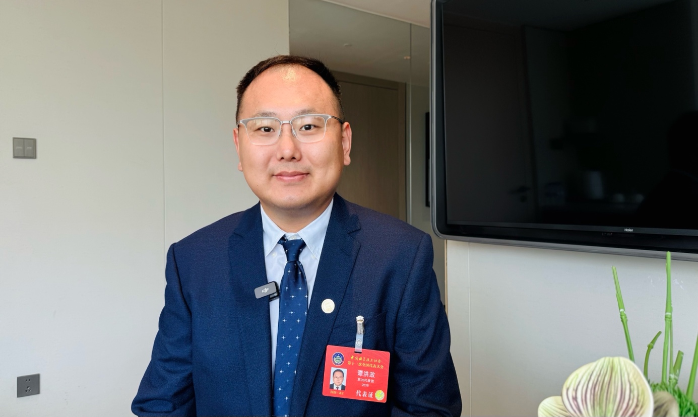 中国科协十一大代表谭洪政：发挥科协桥梁作用 夯实中学教育科创根基